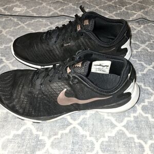 Womens Nike size 9. Used, but still in great condition.